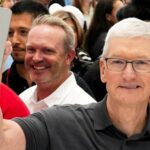 CEO Tim Cook says Apple is ready to open its wallet to catch up in AI