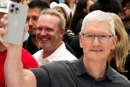 CEO Tim Cook says Apple is ready to open its wallet to catch up in AI