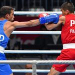 Amit Pangal stuns Olympic champion to clinch gold Amit Pangal stuns Olympic champion to clinch gold